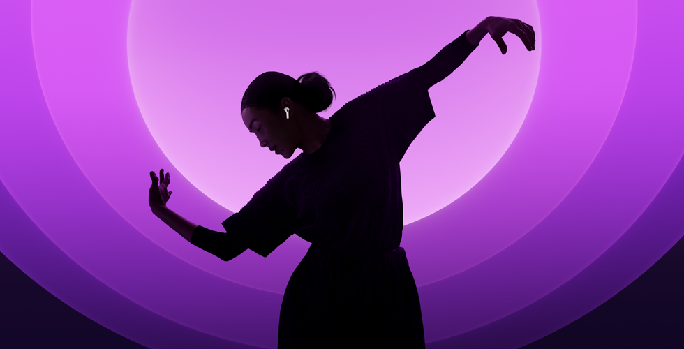 A person dancing while wearing AirPods 5, multicolour background